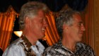 This undated photo released by the U.S. Department of Justice shows former President Bill Clinton and Jeffrey Epstein. (U.S. Department of Justice Department via AP)