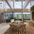 Renders show an immaculate art deco-inspired space that will feature double-storey windows, stacks of marble and stone, soft furnishings and custom chandeliers.