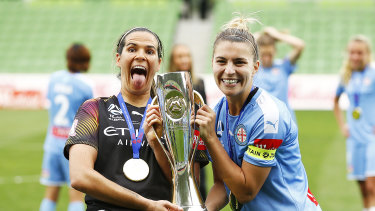 Lydia Williams and Steph Catley celebrate a fourth W-League title for Melbourne City. 