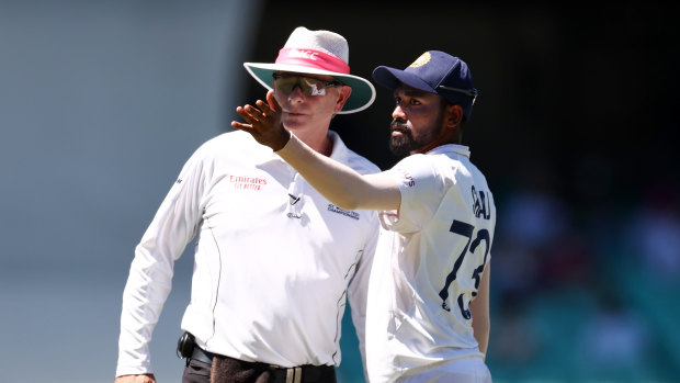 Mohammed Siraj speaks to umpire Paul Reiffel on Sunday.