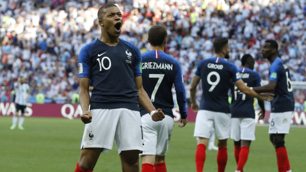 Speedster: French star Kylian Mbappe celebrates scoring against Argentina in the round of 16.