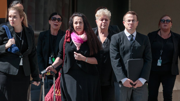 Prosecutor Carmel Barbagallo (centre) arriving for the first day of the Claremont serial killer trial. 