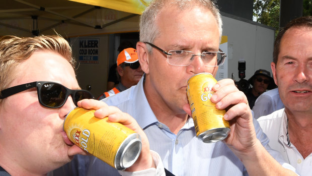 Just a regular bloke: Australian Prime Minister Scott Morrison has a beer with locals on the Sunshine Coast