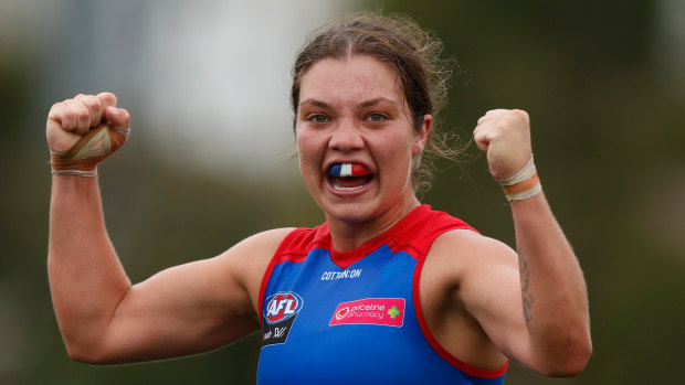 Ellie Blackburn clenches her fists as the final siren sounds