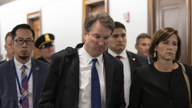 Brett Kavanaugh and his wife Ashley depart after testifying,