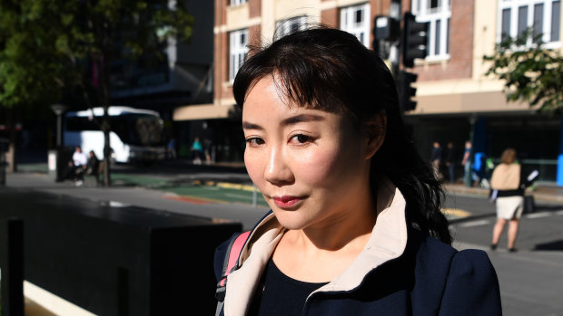 Yutian Li arrives at the District Court in Brisbane on Friday.