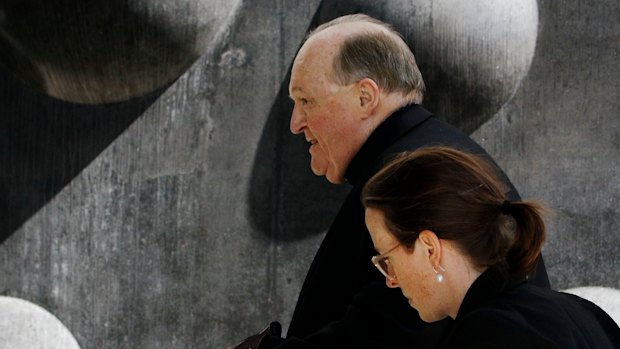 Adelaide Archbishop Philip Wilson   arrives at Newcastle Local Court on Wednesday.