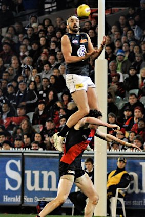 Andrew Walker takes a screamer for Carlton.