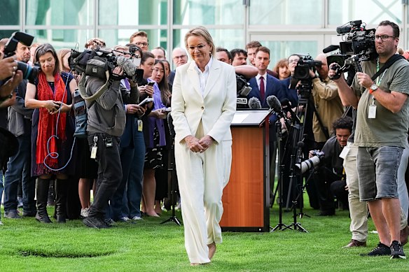 Sussan Ley departs after addressing the media on Friday.