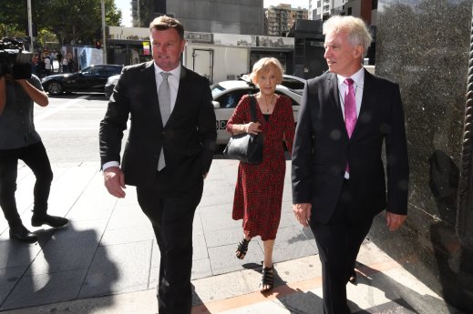 The late Shirley Bell, pictured in 2017, flanker by her son Anthony (left) and lawyer Chris Murphy.
