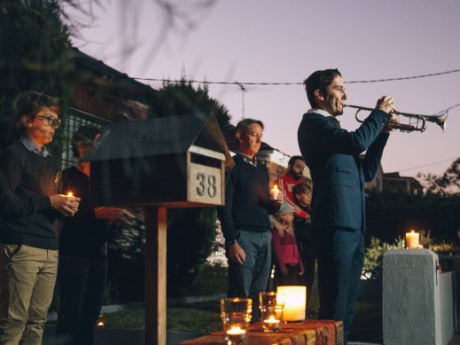 Albie Woodhouse plays The Last Post on trumpet for a driveway dawn service for ANZAC Day in 2020.