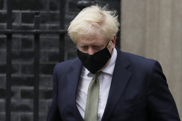 British Prime Minister Boris Johnson leaves Downing Street to address Parliament on Monday.