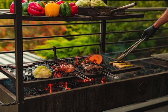 Food is cooked over an open flame at Fire Kitchen. 