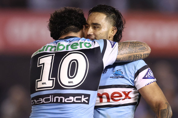 Briton Nikora and Braden Hamlin-Uele celebrate after the Sharks beat the Roosters.