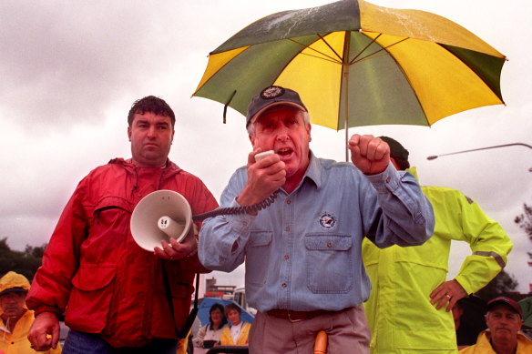 Addressing members at Port Botany in the rain, 1998.