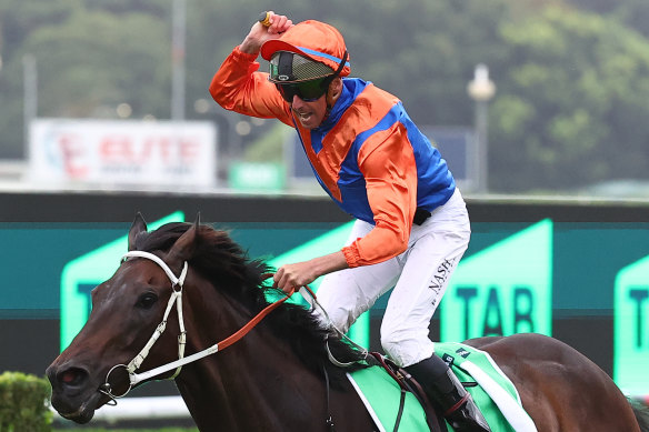 Nash Rawiller salutes as Think It Over holds off Fangirl in the Verry Elleegant Stakes.
