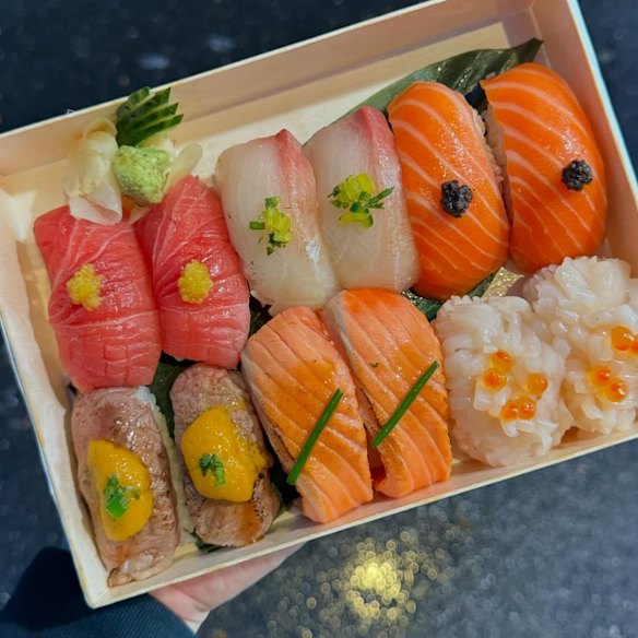 Elka dry-ages and slices a range of fish to make boxes of nigiri to go.