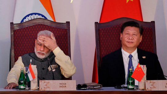 Indian Prime Minister Narendra Modi, left, and Chinese President Xi Jinping attend the BRICS summit in Goa, India, in 2016.