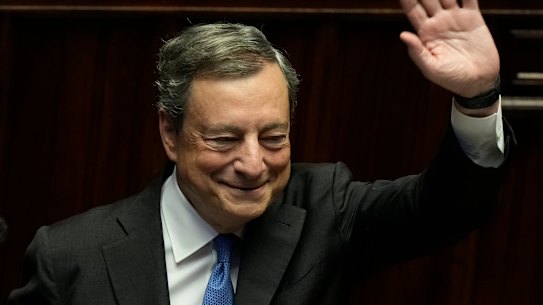 Italian PM Mario Draghi waves to MPs at the end of his address at the Parliament in Rome on Thursday.