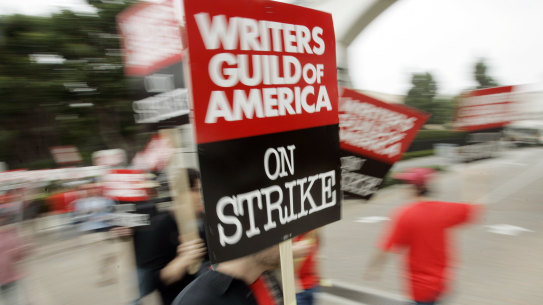 In 2007, picketers march outside the entrance to Sony Pictures Studios in Culver City, California. 