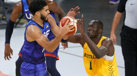 Duop Reath on defence against Jayson Tatum.