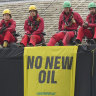 Greenpeace activists sit on the roof of Britain’s Prime Minister Rishi Sunak’s house in Richmond, North Yorkshire, England, after covering it in black fabric on Thursday.