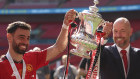 Manchester United manager Erik ten Hag and captain Bruno Fernandes with the trophy.