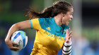 hloe Dalton of Australia runs with the ball during a Women’s Pool A rugby match between Australia and Fiji on Day 1 of the Rio 2016 Olympic Games.