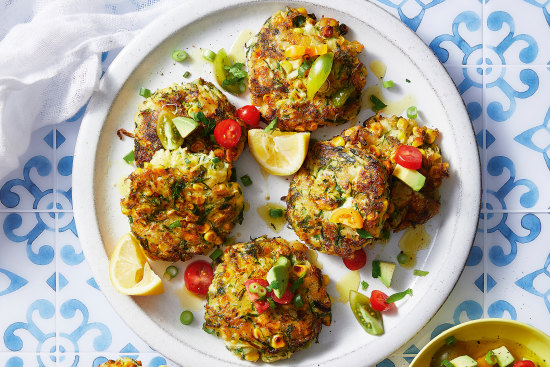 Zucchini and corn fritters with salsa.