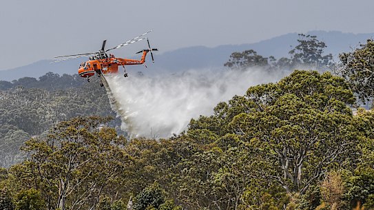 Experts are calling for a change in firefighting tactics, including the rapid water-bombing of new fires.