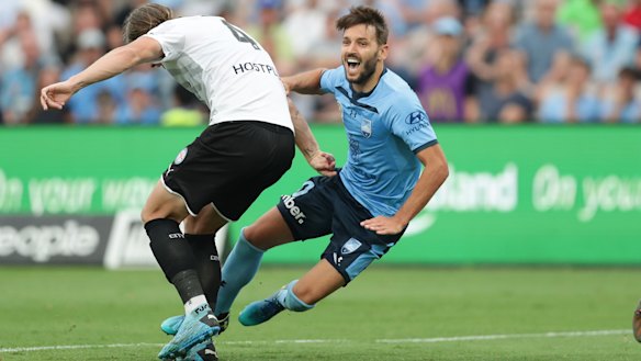 Penalised: Sydney FC's Milos Ninkovic is brought down in the box by City's Harrison Delbridge.