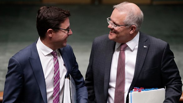 Drought Minister David Littleproud and Prime Minister Scott Morrison share a laugh despite tension between the Liberals and the Nationals over drought. 
