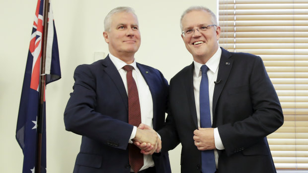 Deputy Prime Minister Michael McCormack and Prime Minister Scott Morrison in the party room meeting.