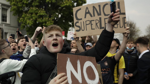 Chelsea fans protest against the proposed Super League outside Stamford Bridge.