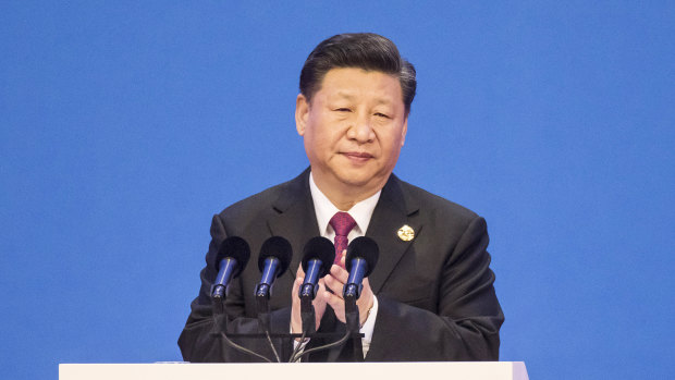 Xi Jinping applauds ahead of delivering his speech at Boao on Tuesday.