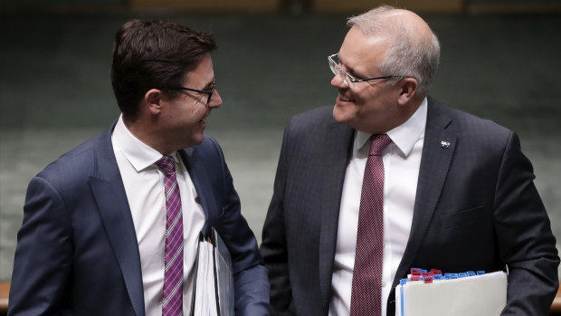 Drought Minister David Littleproud and Prime Minister Scott Morrison share a laugh despite tension between the Liberals and the Nationals over drought. 