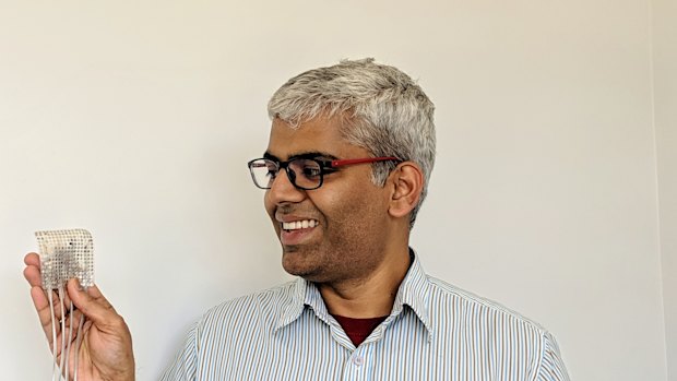 Gopala Anumanchipalli, one of the study's authors, holds a set of electrodes similar to the ones used in the study.