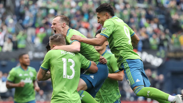 Seattle celebrate Kelvin Leerdam's goal during the MLS Cup final.