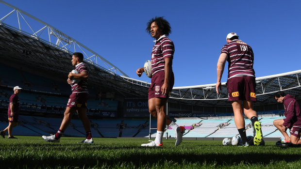 Felise Kaufusi (centre) joins his team mates at ANZ Stadium on Tuesday ahead of this week's Origin match in Sydney.