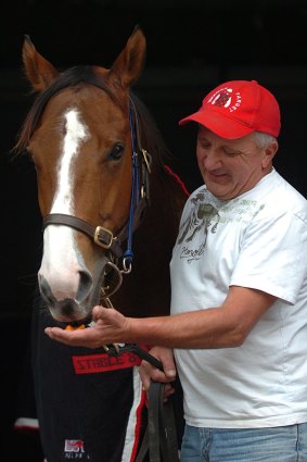 Worldbeaters: Queanbeyan horse trainer Joe Janiak  with his bargain buy Takeover Target.