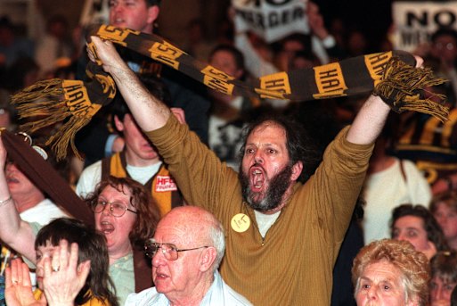 Unhappy Hawthorn supporters at the merger meeting at Camberwell Civic Centre.