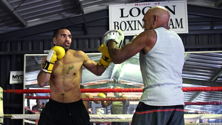 Dropping bombs: Tony Mundine (right) says