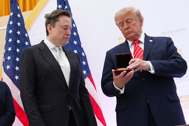 President Donald Trump presents the National Medal of Science to Elon Musk.