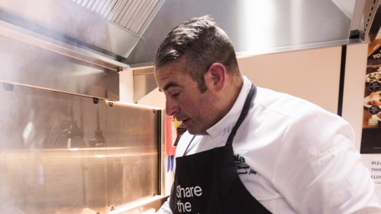 MLA corporate executive chef Sam Burke cooks up climate-neutral lamb at the Meat and Livestock Association’s North Sydney offices.