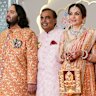 Billionaire Mukesh Ambani, centre, with, from left, son Akash, daughter-in-law Shloka, son Anant, wife Nita, daughter Isha and son-in-law Anand Piramal at the wedding of his son Anant to Radhika Merchant.