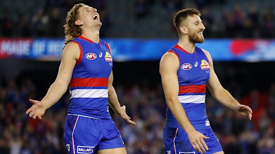 MELBOURNE, AUSTRALIA - MAY 22: Aaron Naughton (left) and Marcus Bontempelli of the Bulldogs celebrate during the 2021 AFL Round 10 match between the Western Bulldogs and the St Kilda Saints at Marvel Stadium on May 22, 2021 in Melbourne, Australia. (Photo by Michael Willson/AFL Photos via Getty Images)