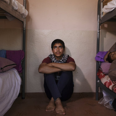 Ahmed Nazari, 17, in a room he shares with other unaccompanied minors at the Gazergah Transit Centre.