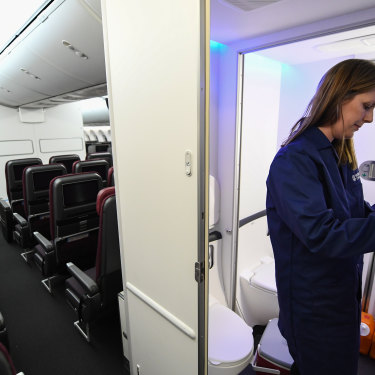 Dr Tracey Sletten from Alertness CRC taking urine samples on board QF7879 to measure concentration of melatonin as an indication of circadian timing in flight crew. 