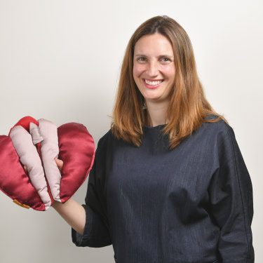 Occupational therapist Anita Brown-Major and her satin vulva puppet, which she uses in teaching.