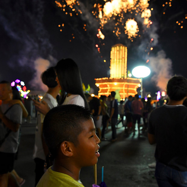 Samsun watches fireworks at the Lop Buri’s Loi Krathong festival celebrations.